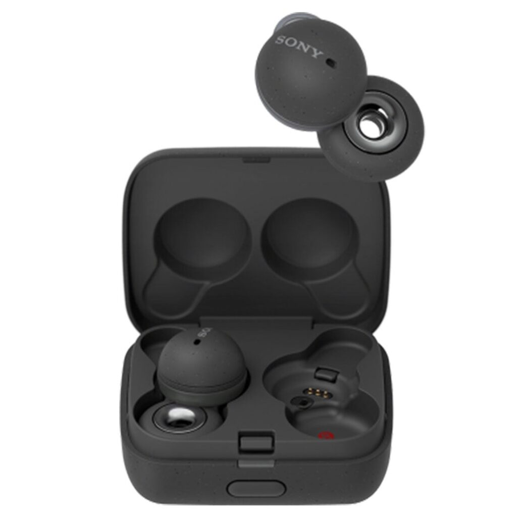A Sony Link bud just above the small charging case. The buds are in black and look like a berry attached to a small donut. The donut sits over your ear canal when wearing. 