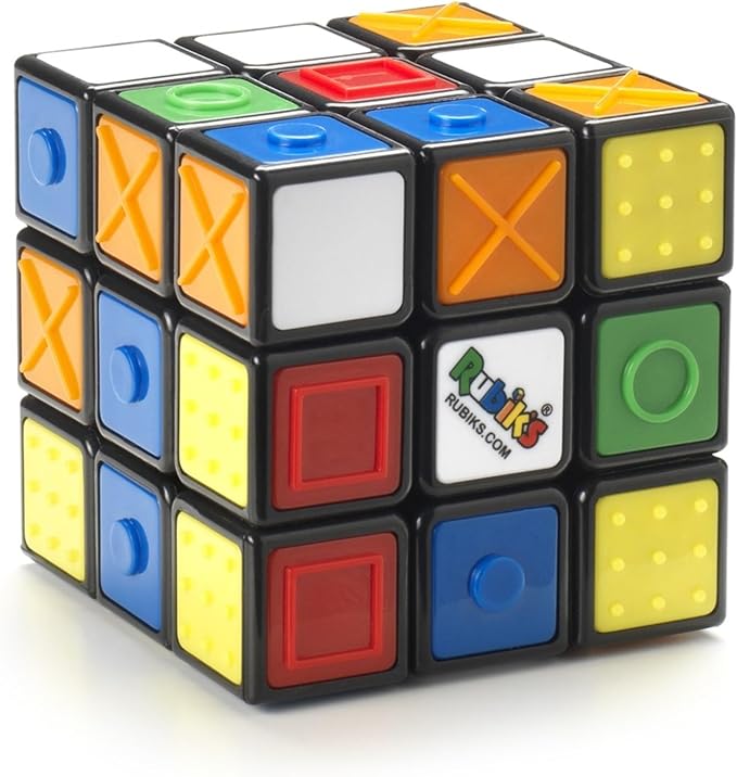 A Rubrik's cube showing that each colour has a different tactile marking. e.g. Green has a circle and red has a square on it.